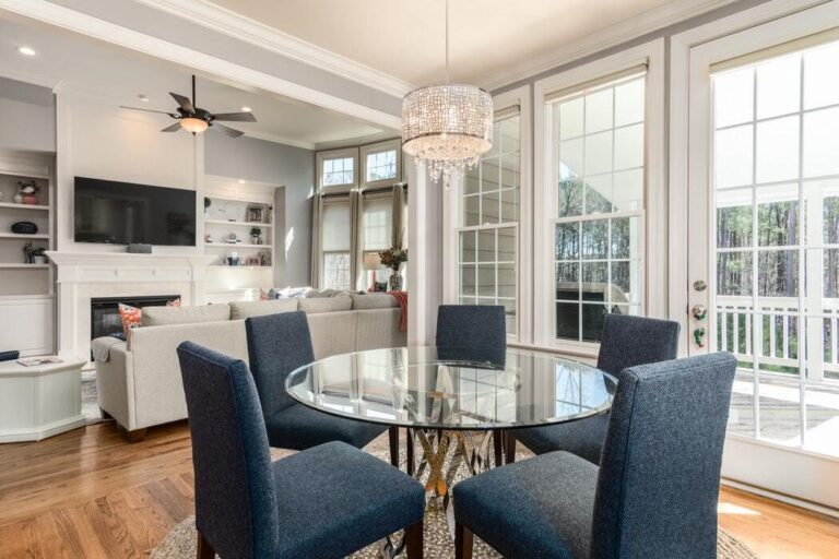 Bright living room with large windows letting in natural light